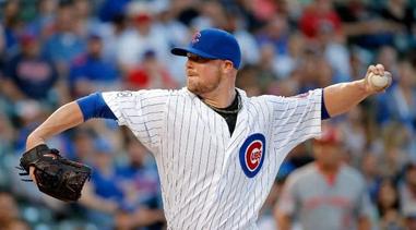 Faced with another throw to first base, Jon Lester needed to throw his  whole glove